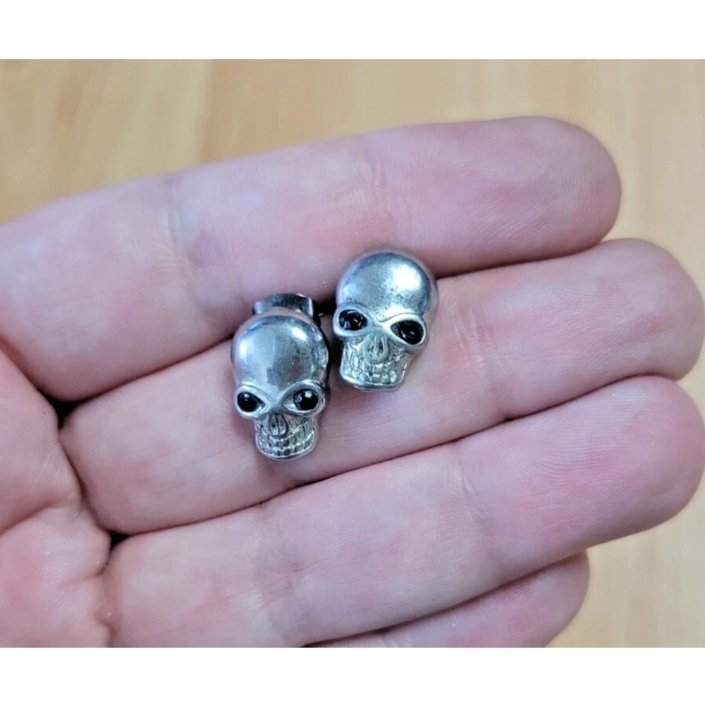 Aldo skull stud earrings